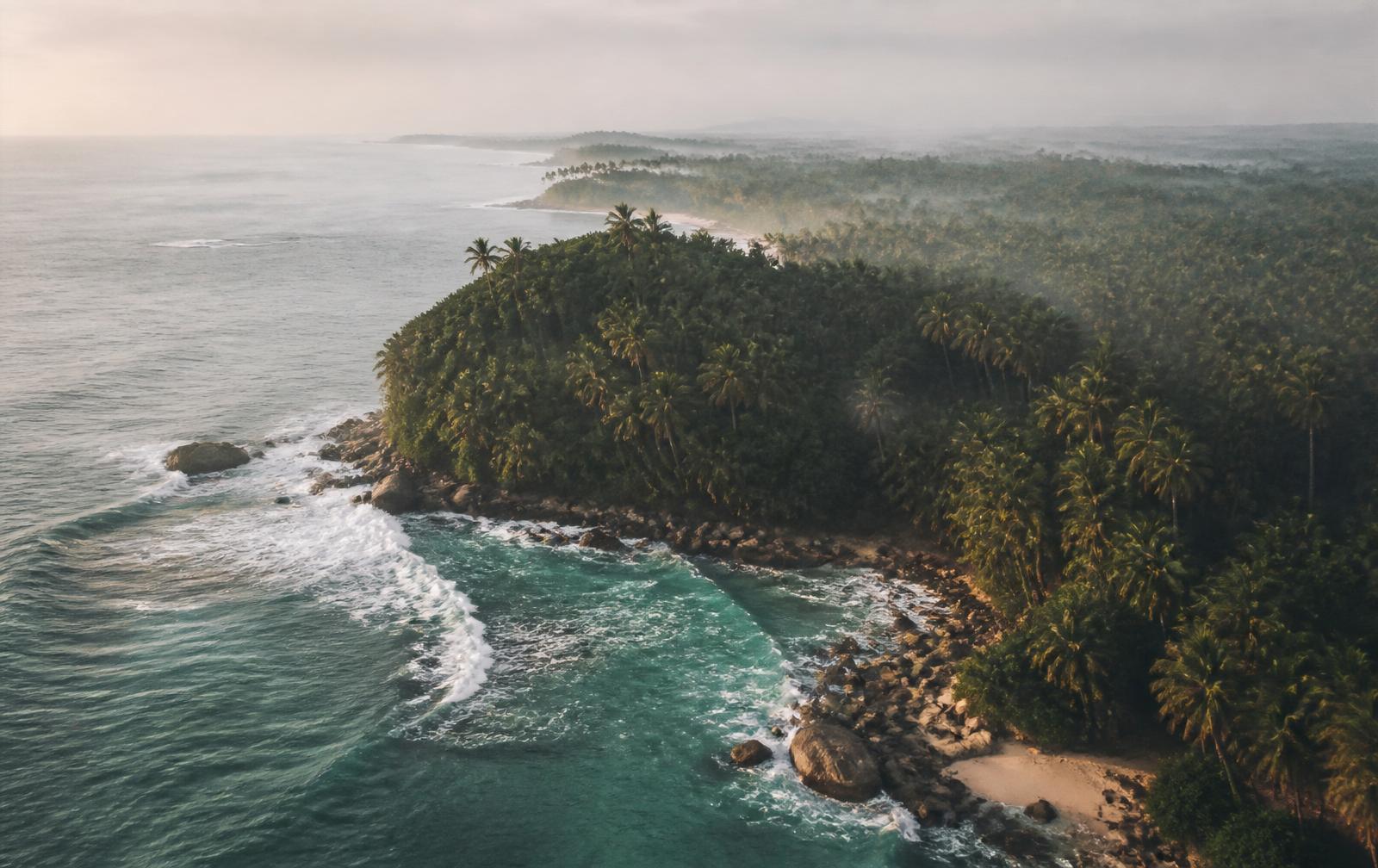 Aerial view of the Sri Lankan south coast where jungle meets the ocean