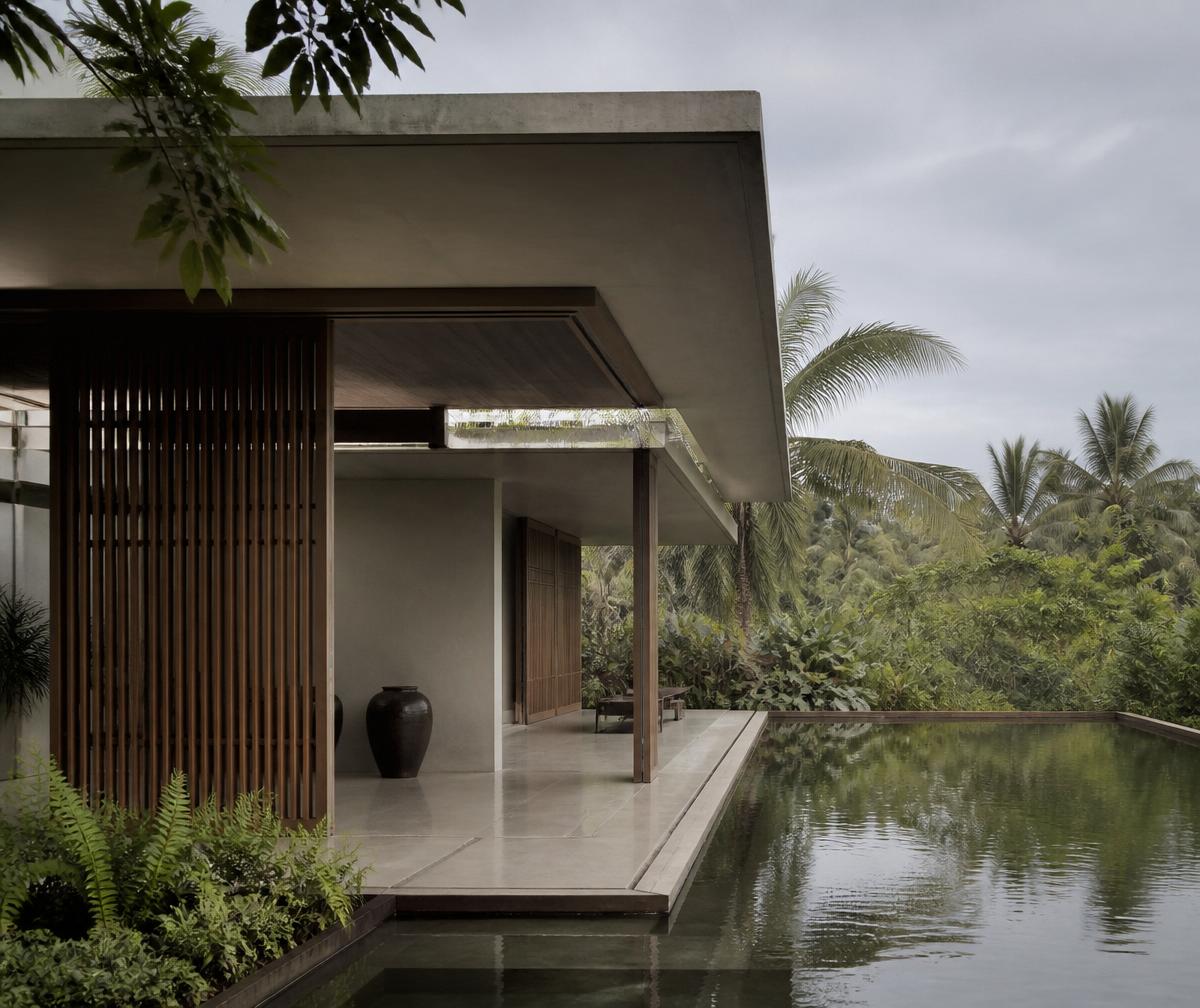 Concept image of a contemporary tropical residence with a reflecting pool